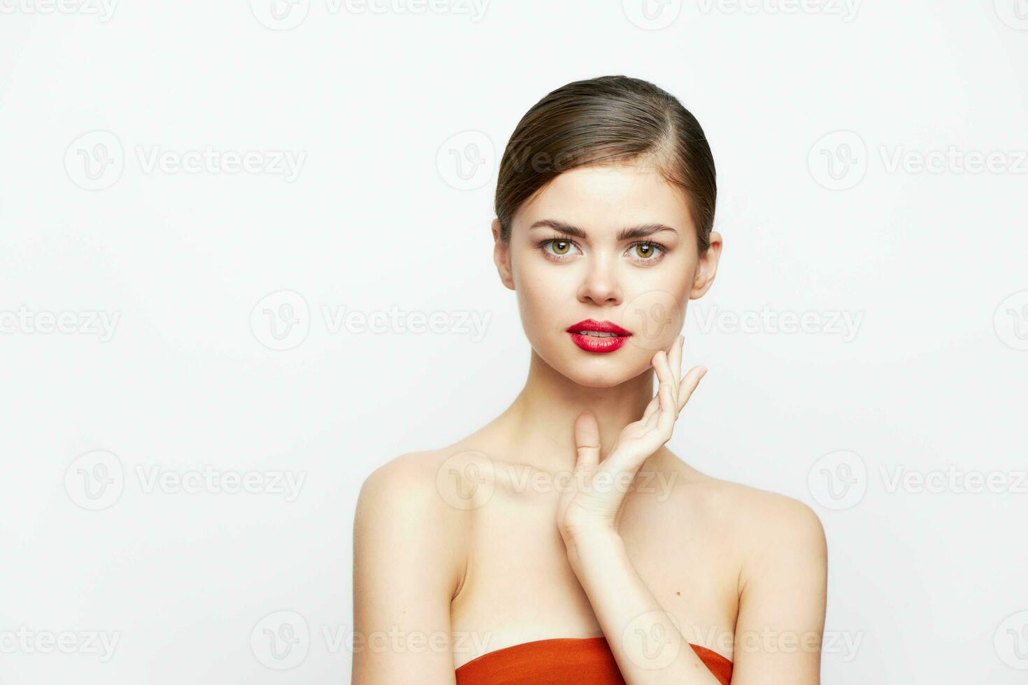 woman with bare shoulders Attractive look red lips body care photo