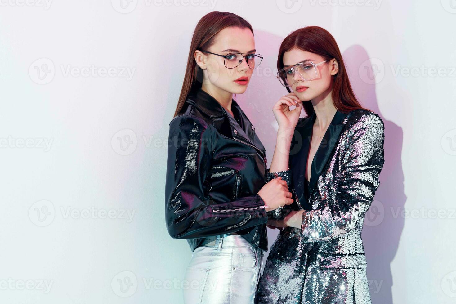 attractive women in fashionable disco clothes posing in studio 22637901  Stock Photo at Vecteezy
