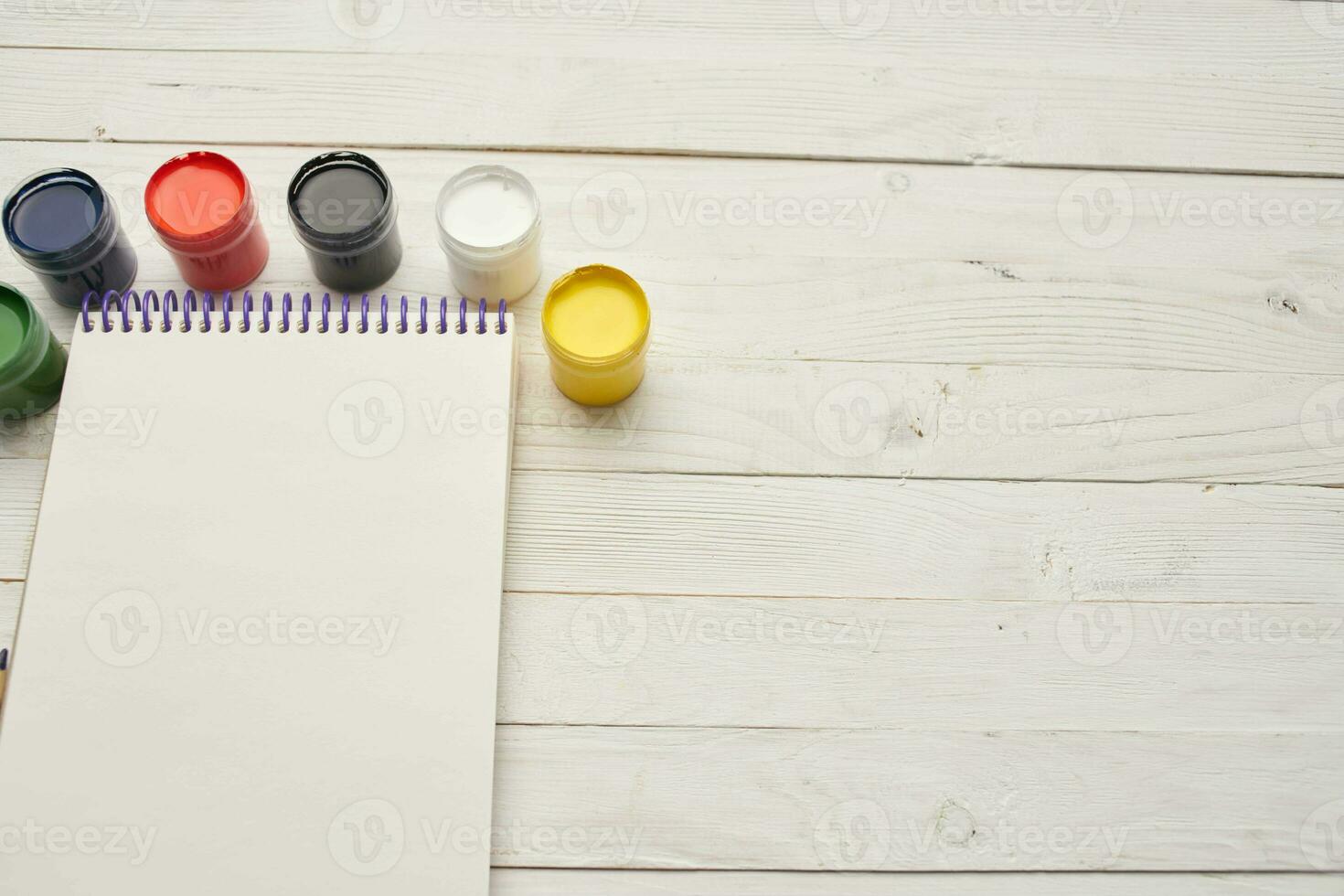 drawing pad watercolor paints pencils tools for artist photo