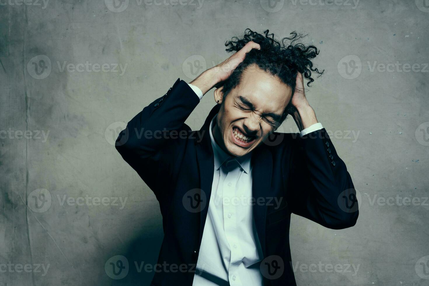 guy with curly hair blazers fashion modern style business photo