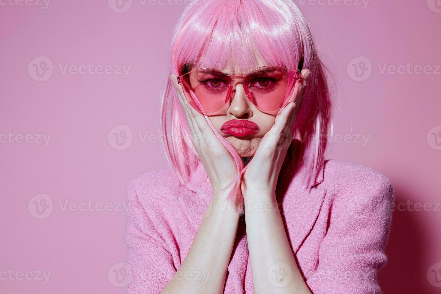 Beautiful fashionable girl bright makeup pink hair glamor stylish glasses color background unaltered photo