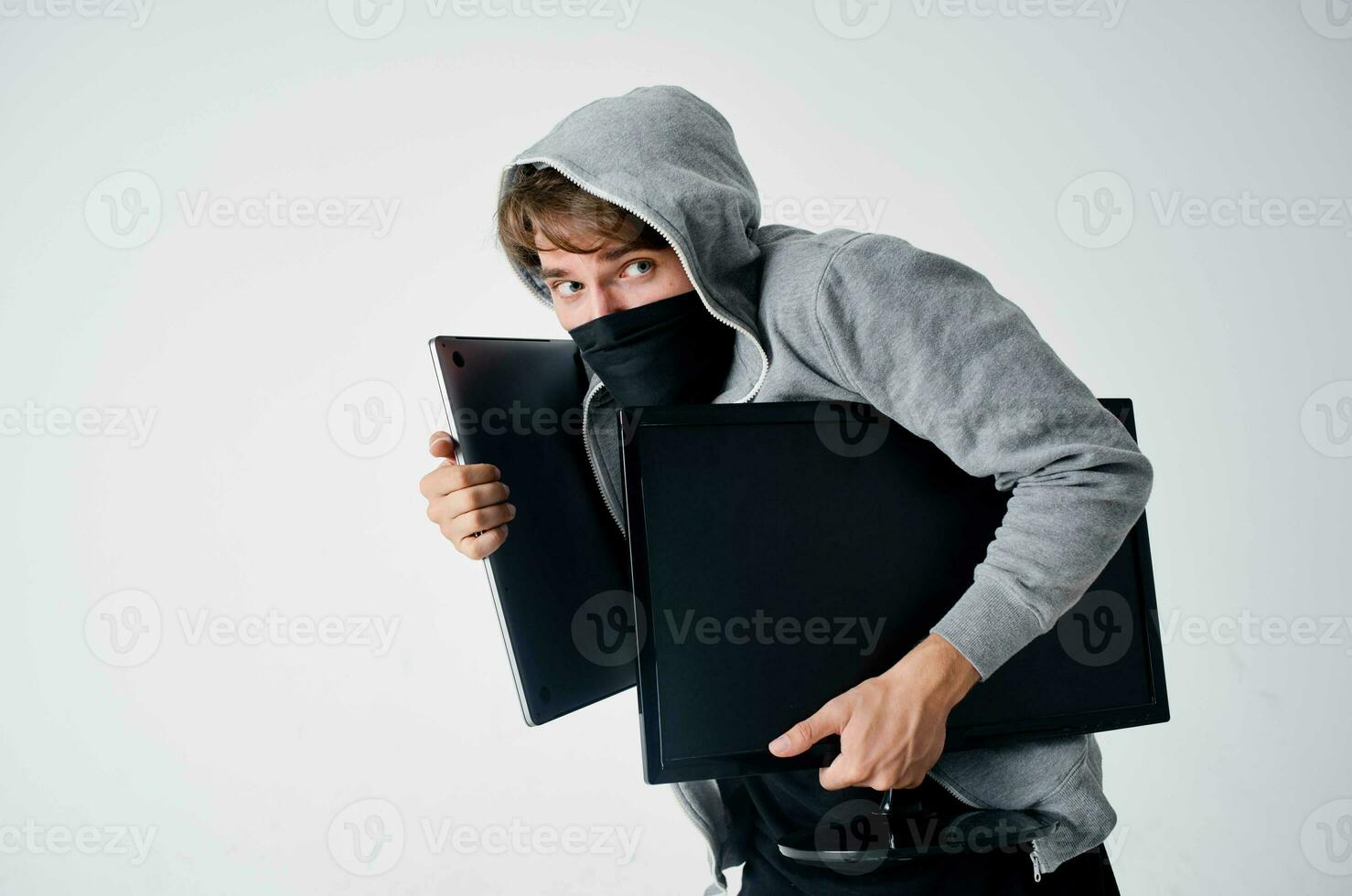 masked man hooded head hacking technology security light background photo