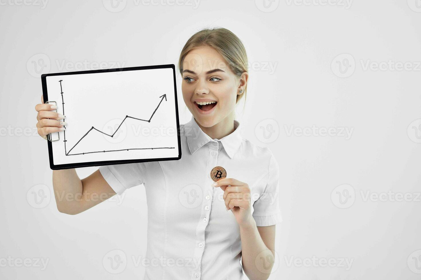 Businesswoman in a white shirt with a folder in hand light background photo