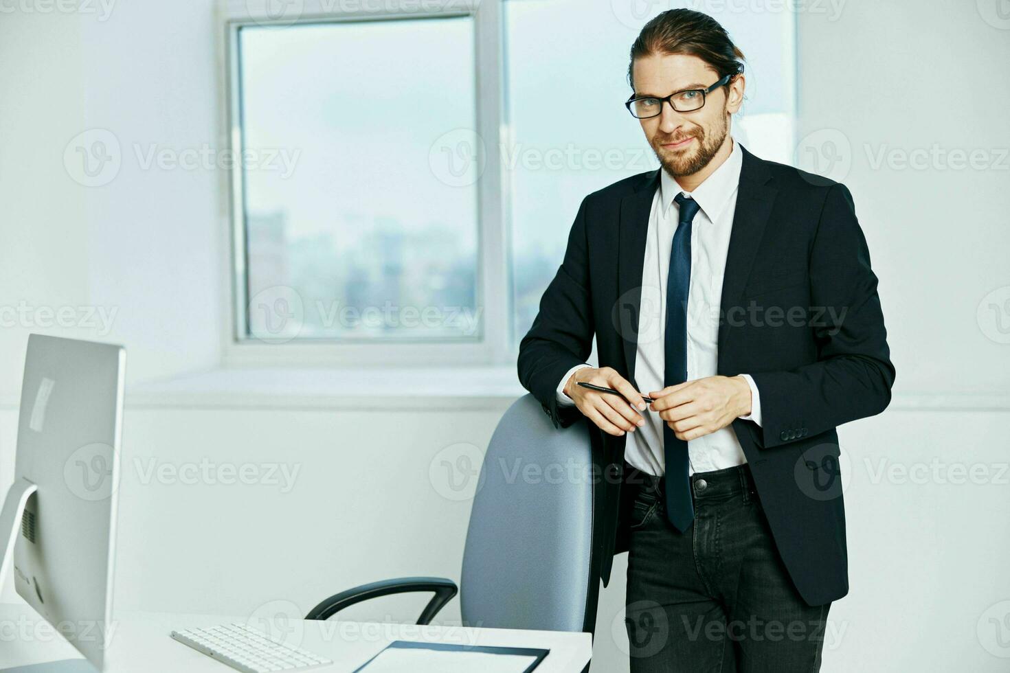 man in a suit in a suit office work phone technologies photo