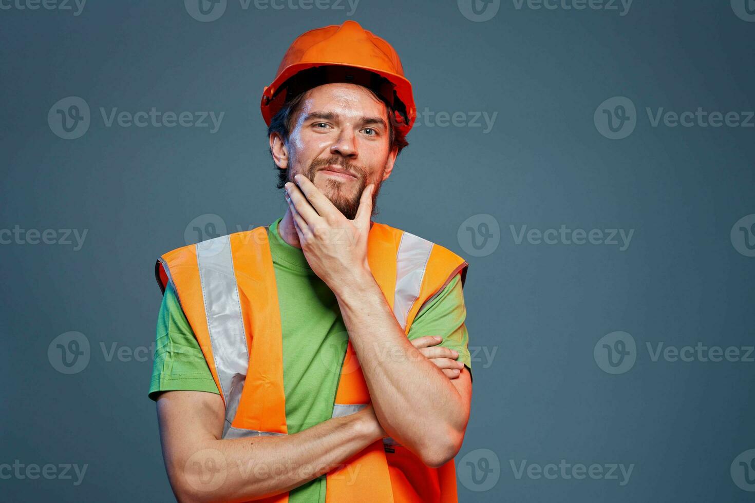 Cropped view of bearded man in working uniform construction engineer photo