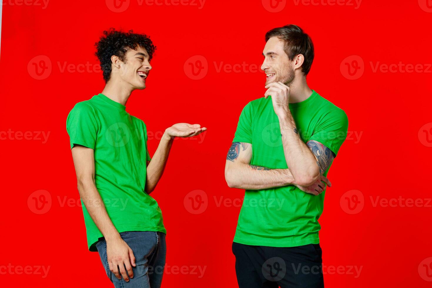 Cheerful friends Green t-shirt communication emotions red background photo