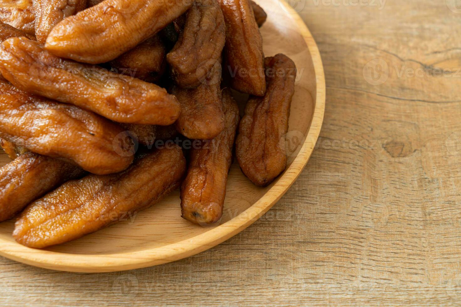 sun dried banana on plate photo