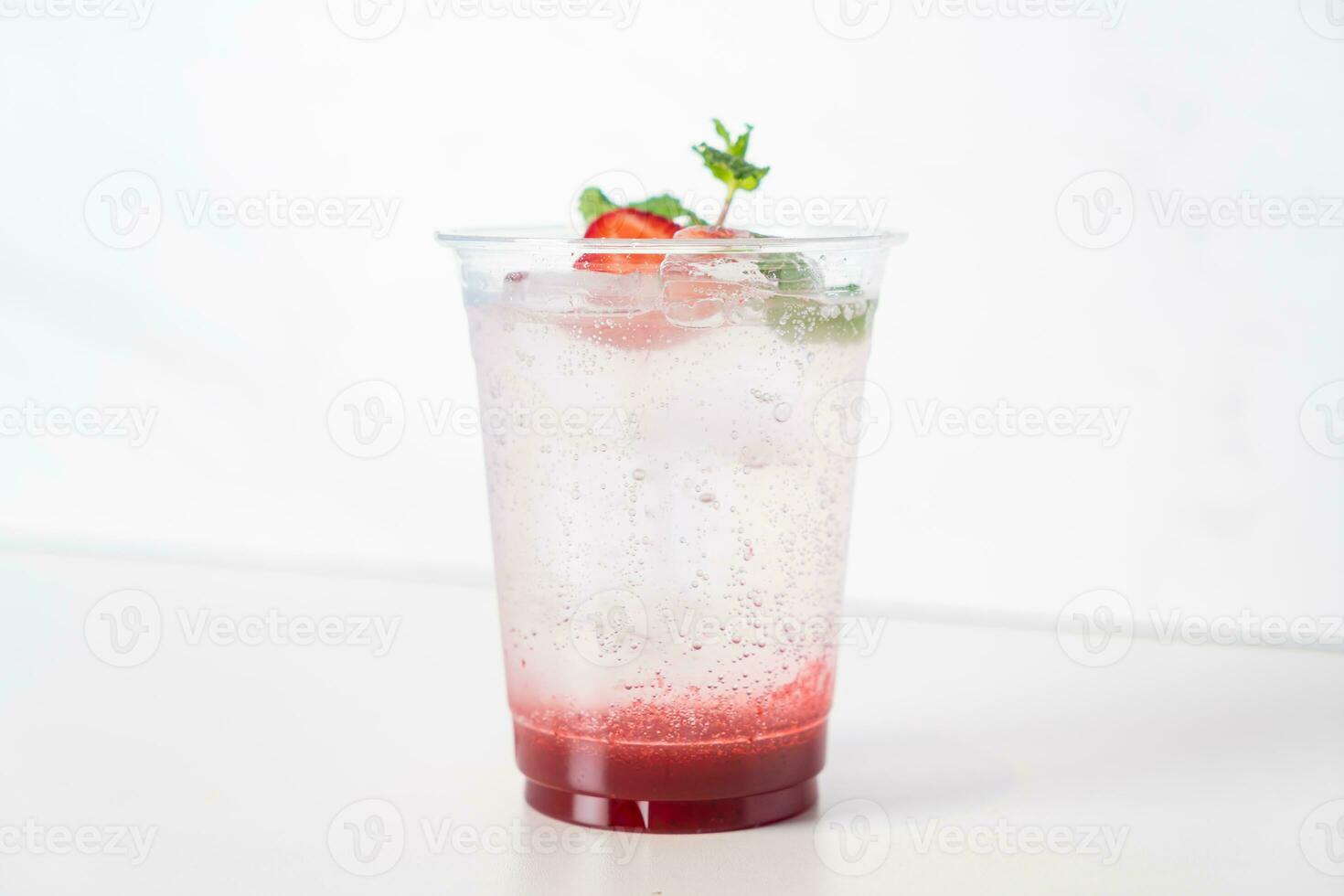 strawberry with soda in glass photo