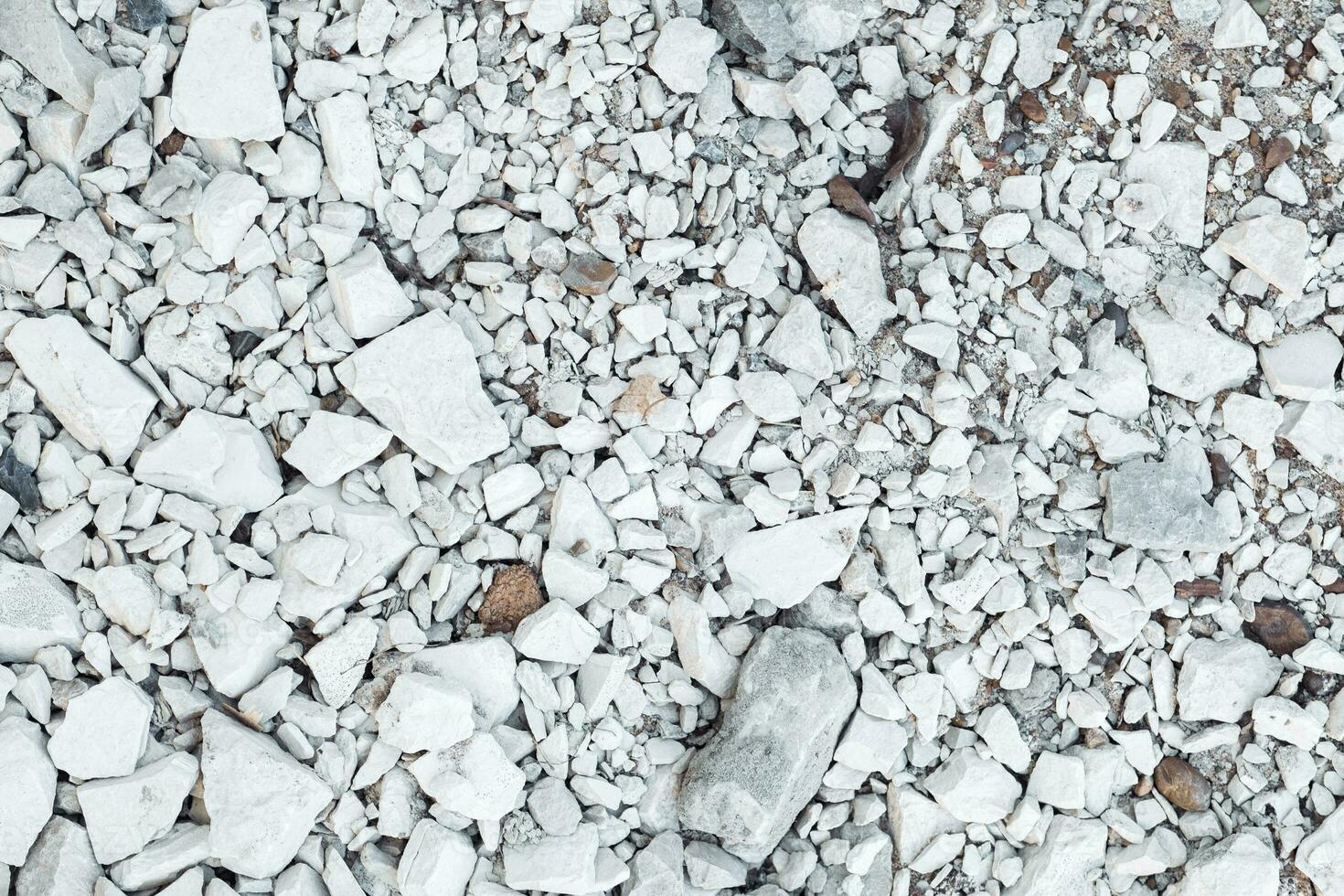 background of white stones, pebbles photo