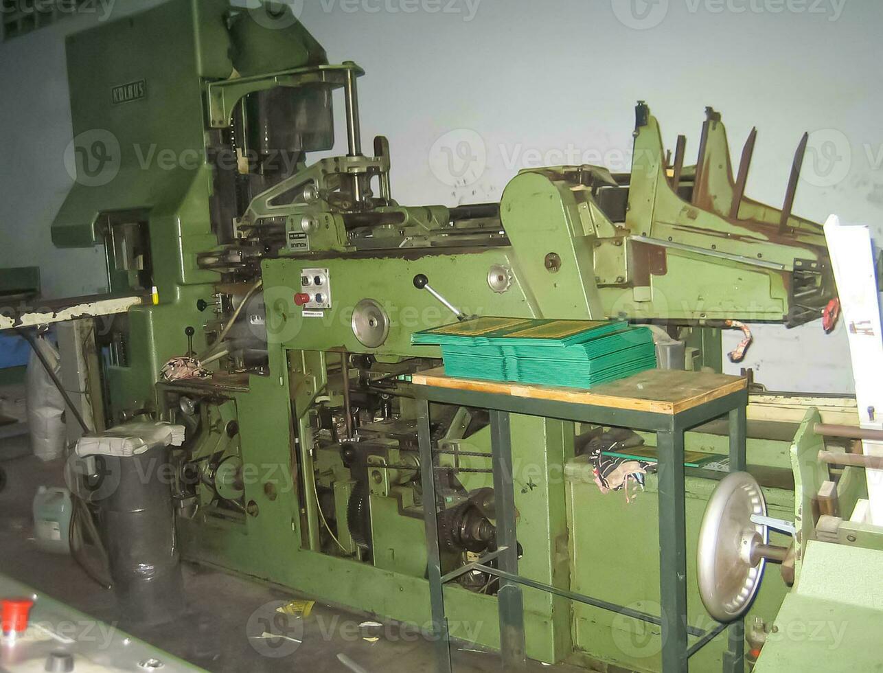 machines on a large printing plant factory, printing of books photo