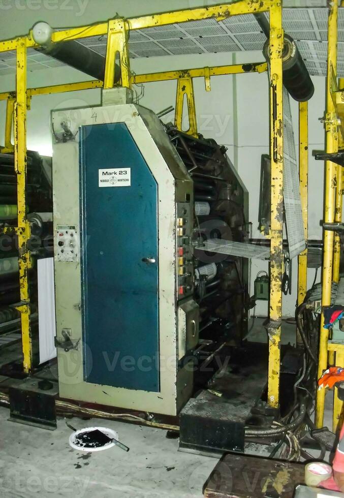 machines on a large printing plant factory, printing of books photo