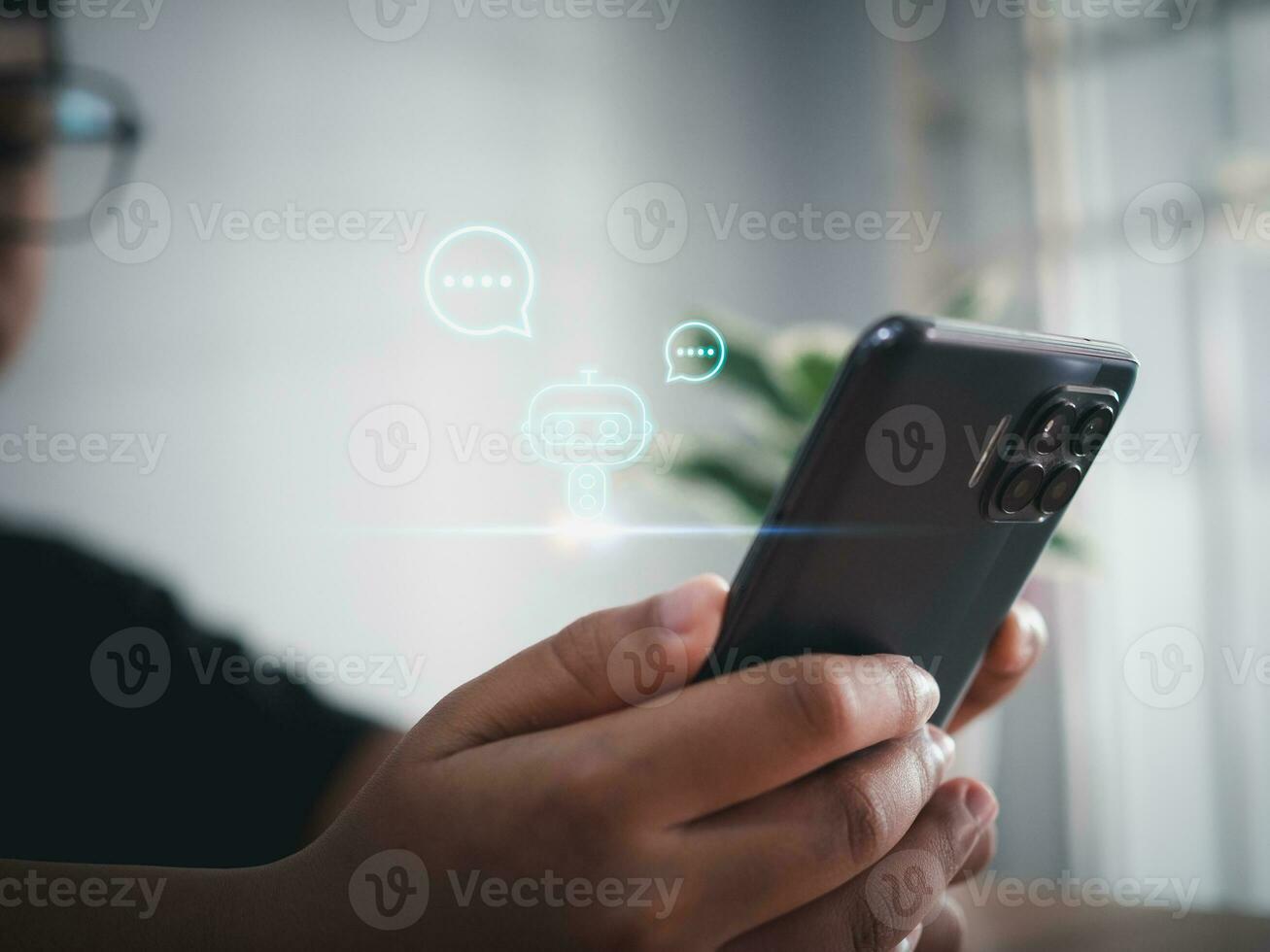 A boy hand uses a smartphone to type live chat, ask, answer with an artificial intelligence system. chat bot. Ai. photo