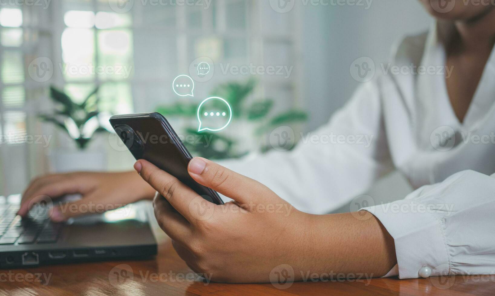 Businesswoman hand using smartphone typing live chat on digital web communication application and social network concept. social media application chat box. photo