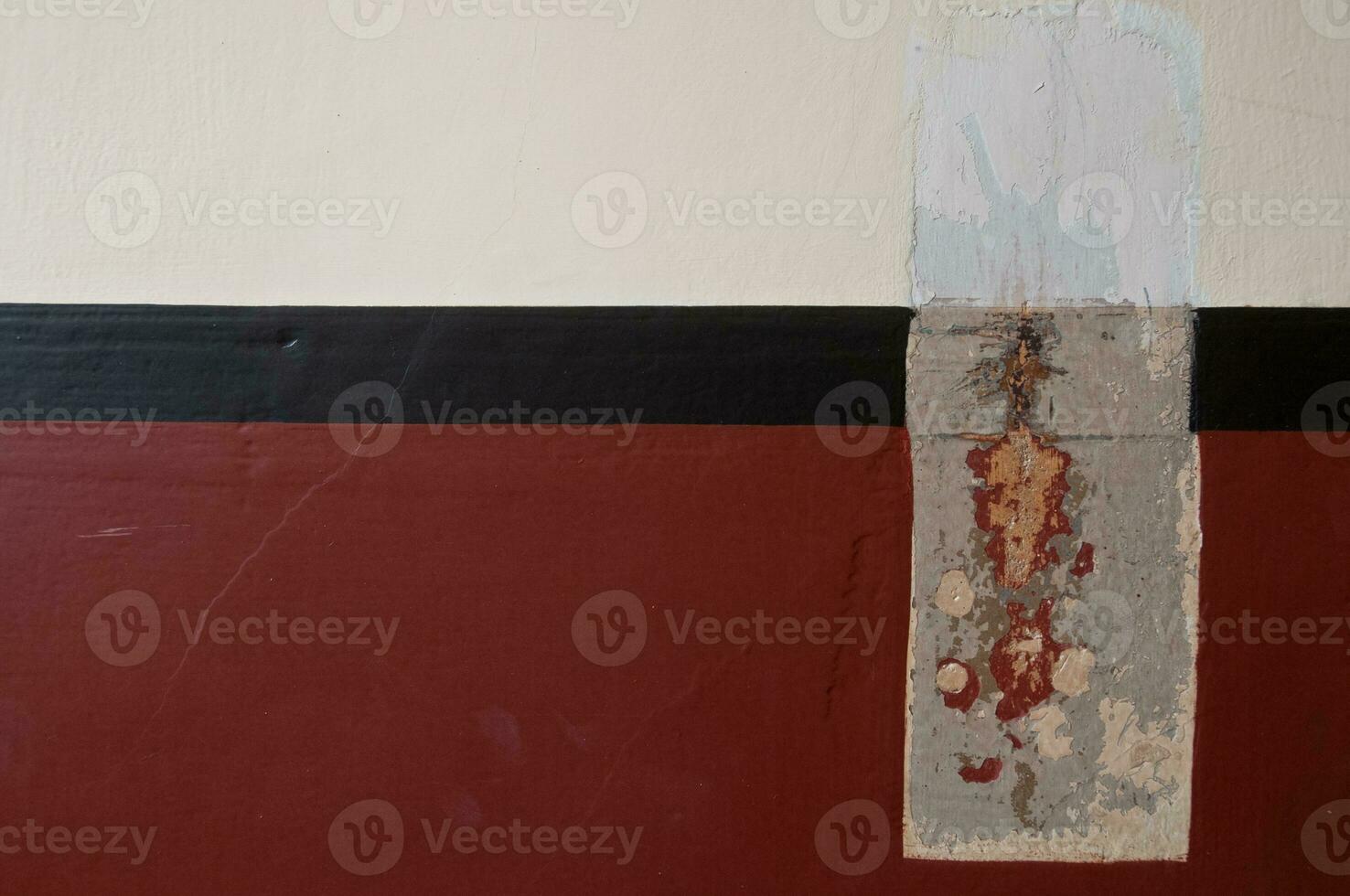 Cement wall with red stain - for backdrop and copy space photo