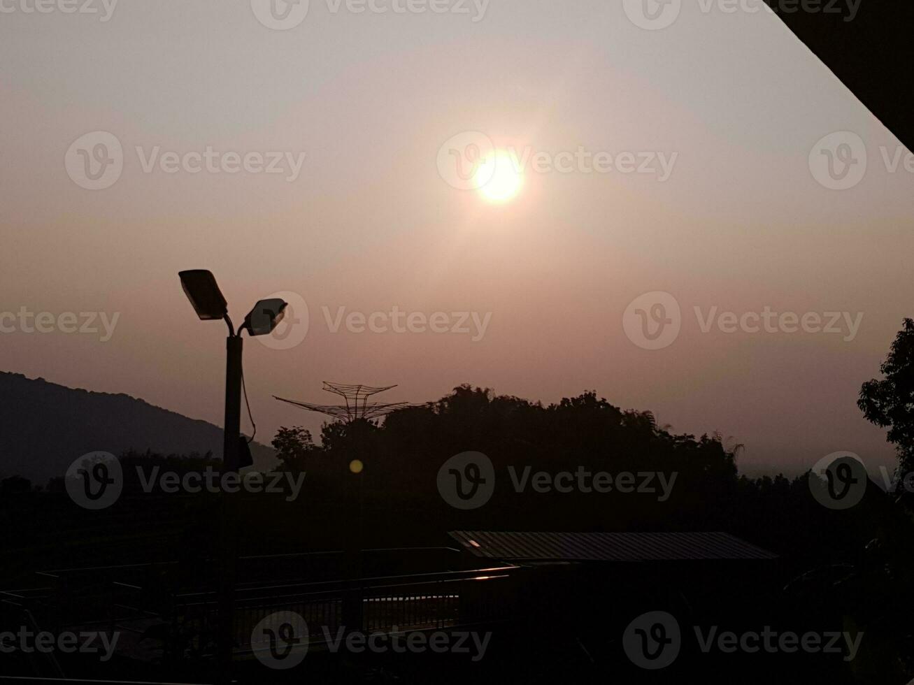 Beautiful sunset seen from the hill near Kediri City photo