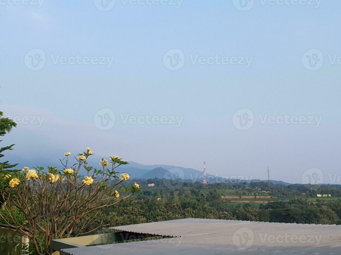 The view of the city of Kediri that can be seen from the hill is beautiful and calm photo