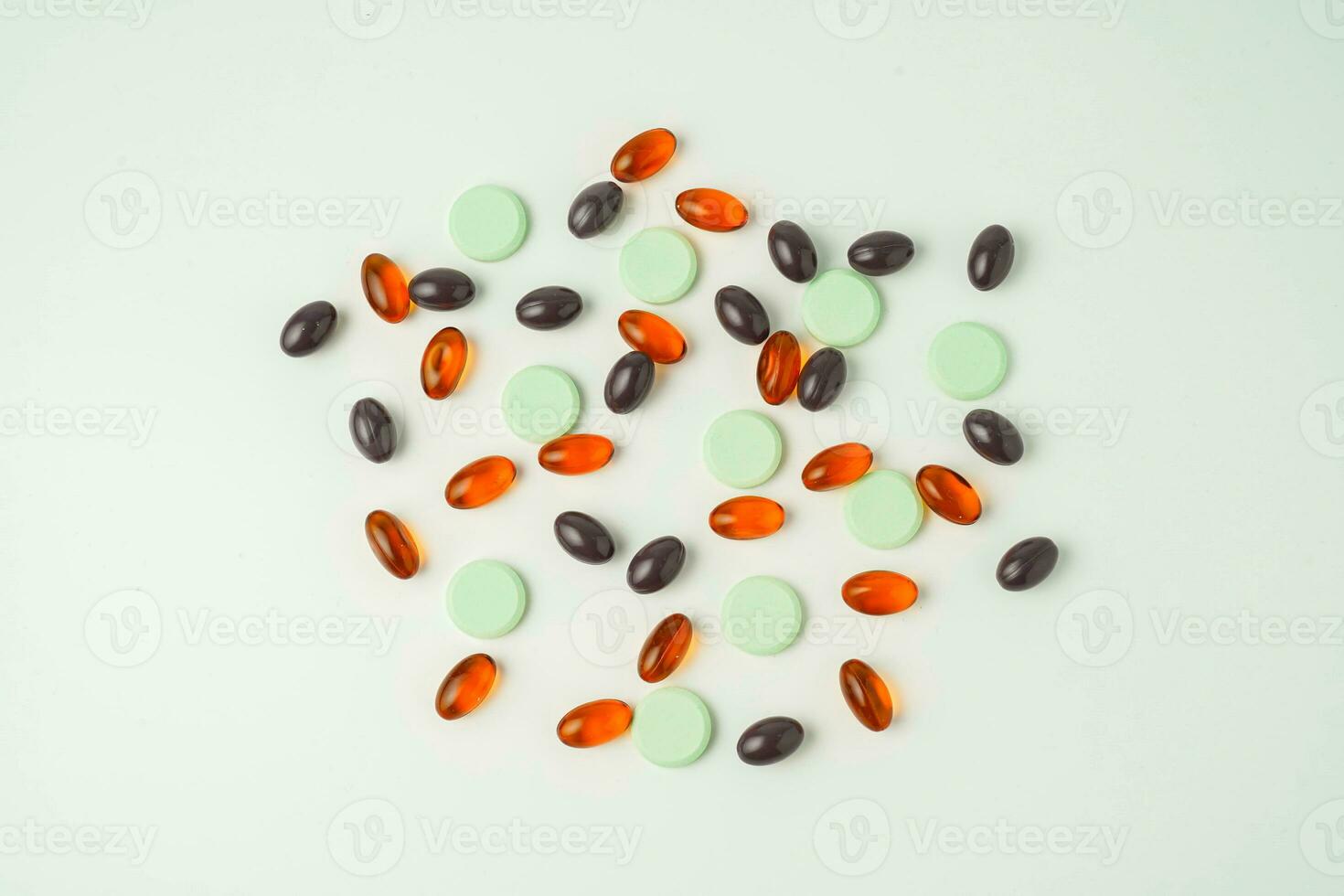Many different tablet pills on white background, flat lay, with copy space. photo