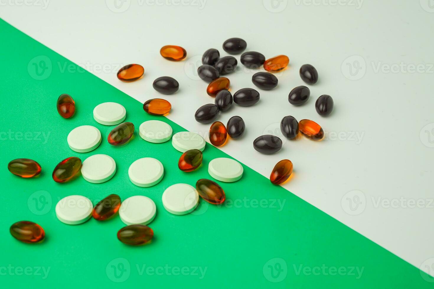Many different tablet pills on color background, flat lay, with copy space. photo