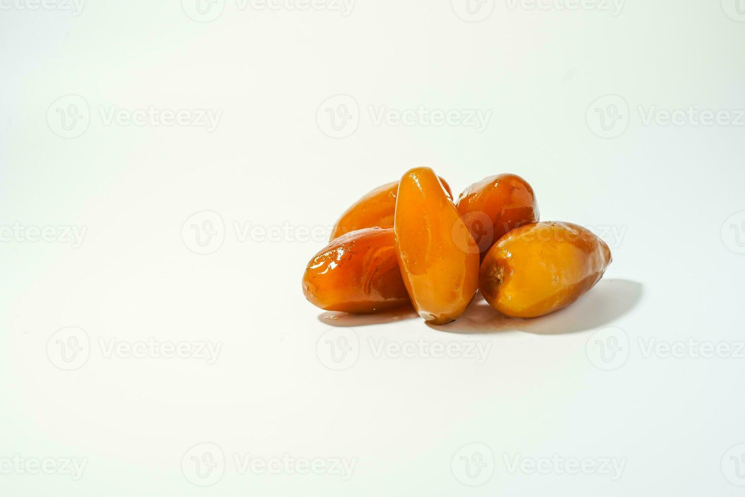 Fresh ripe yellow dates, fresh dates ruthob isolated on white background photo