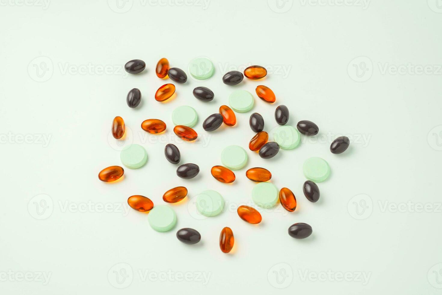 Many different tablet pills on white background, flat lay, with copy space. photo