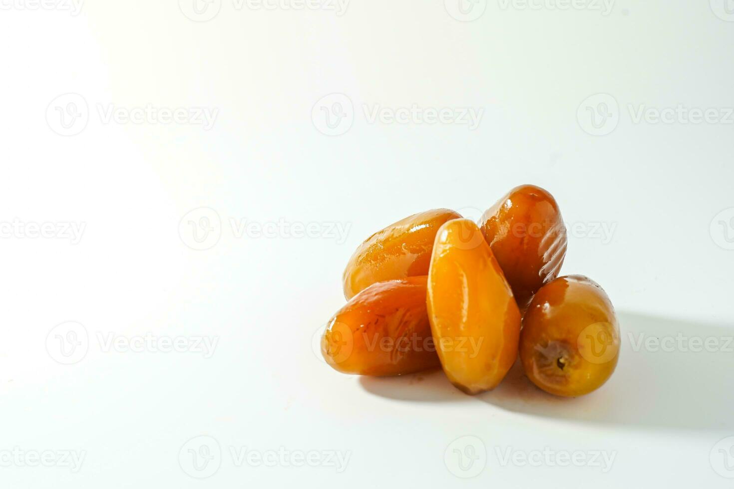 Fresh ripe yellow dates, fresh dates ruthob isolated on white background photo