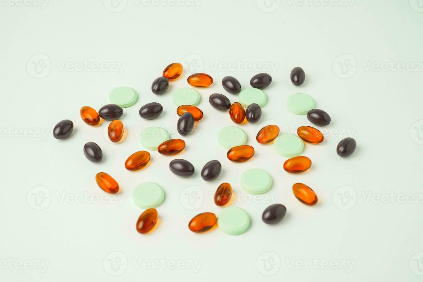Many different tablet pills on white background, flat lay, with copy space. photo