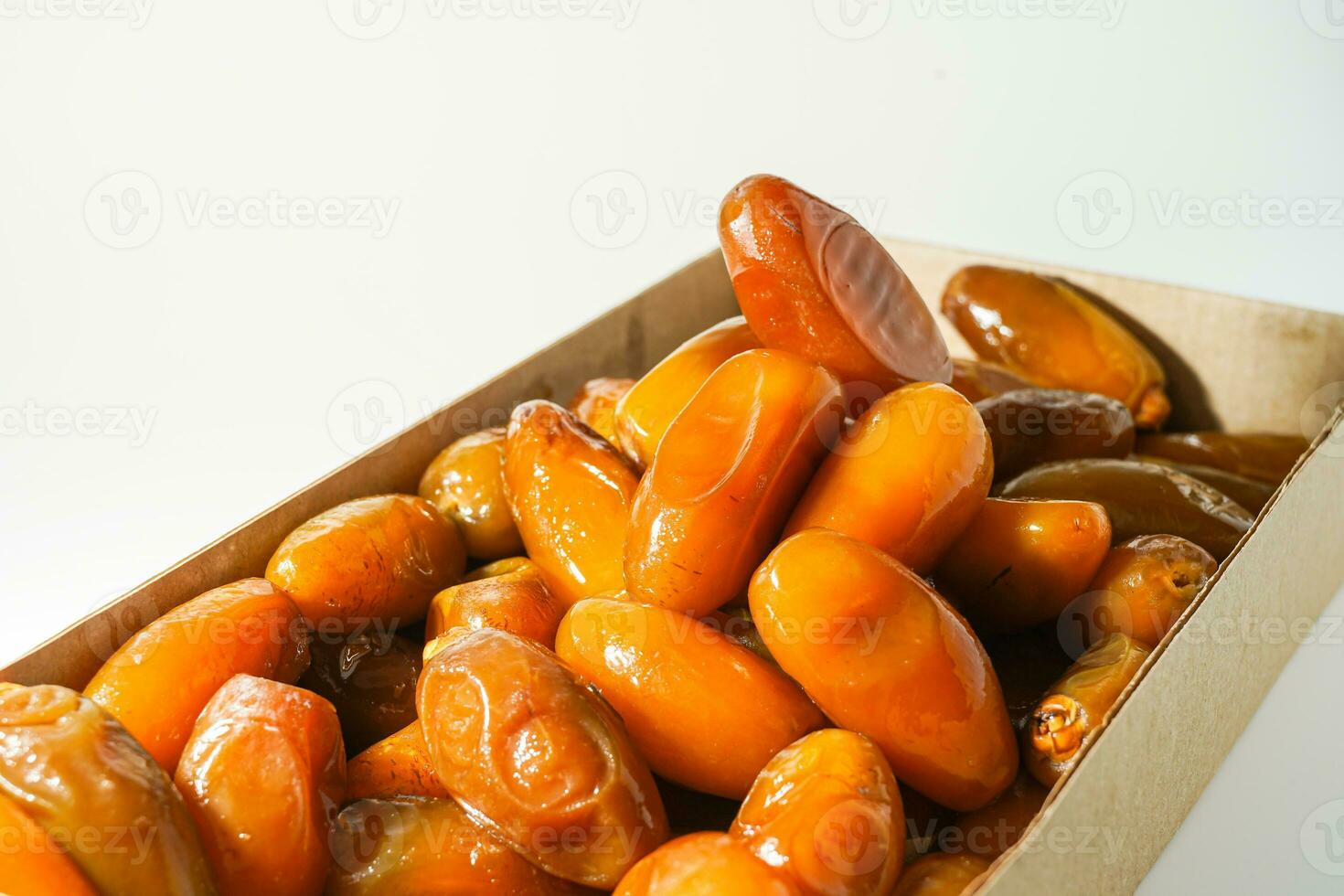 Fresh ripe yellow dates, fresh dates ruthob isolated on white background photo