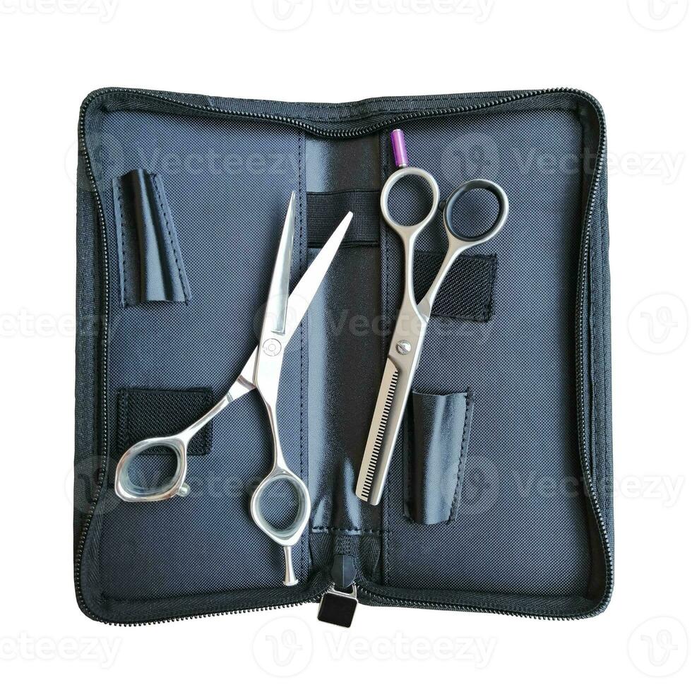 hairdresser tool kit, scissors in an open case photo