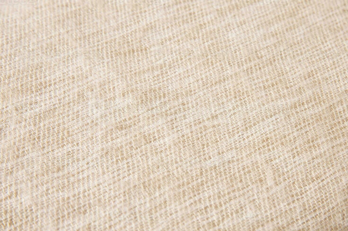 Cream colored wool fabric texture photo
