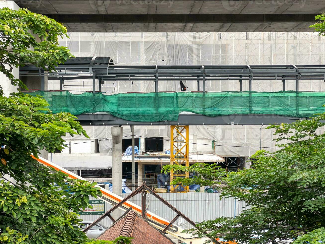 The unfinished metal frame of the sky walks bridge. photo