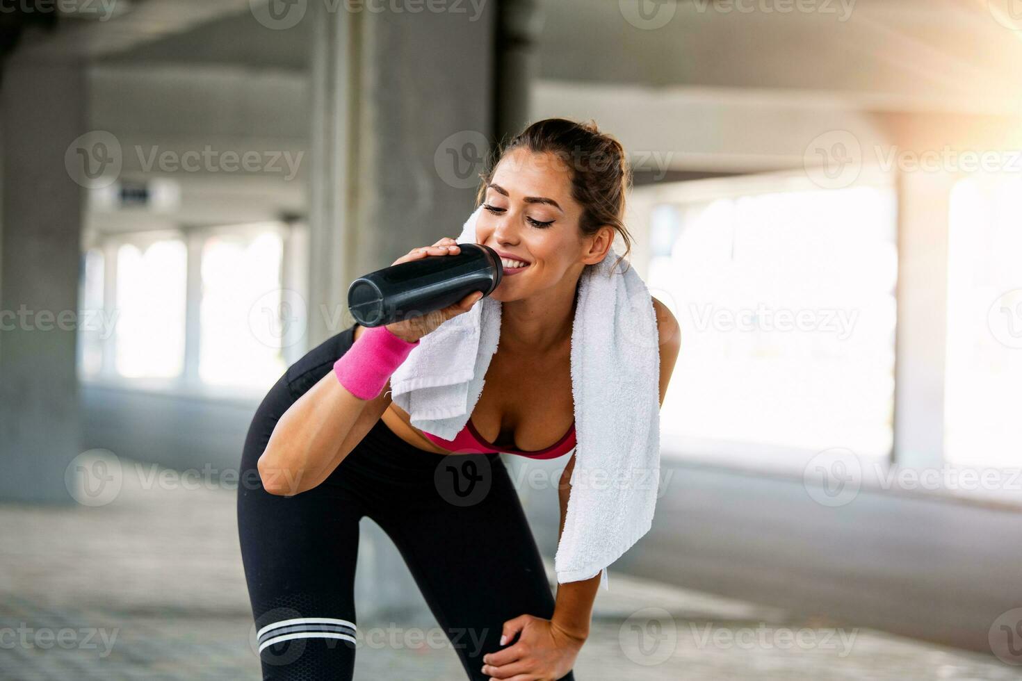 Teen girl hold bottled water after exercising, vignette toned, close up  Stock Photo - Alamy