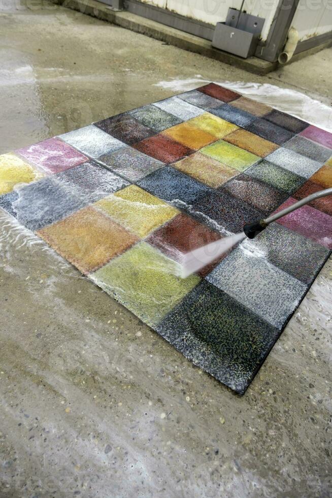 Cleaning a carpet with water 23748974 Stock Photo at Vecteezy