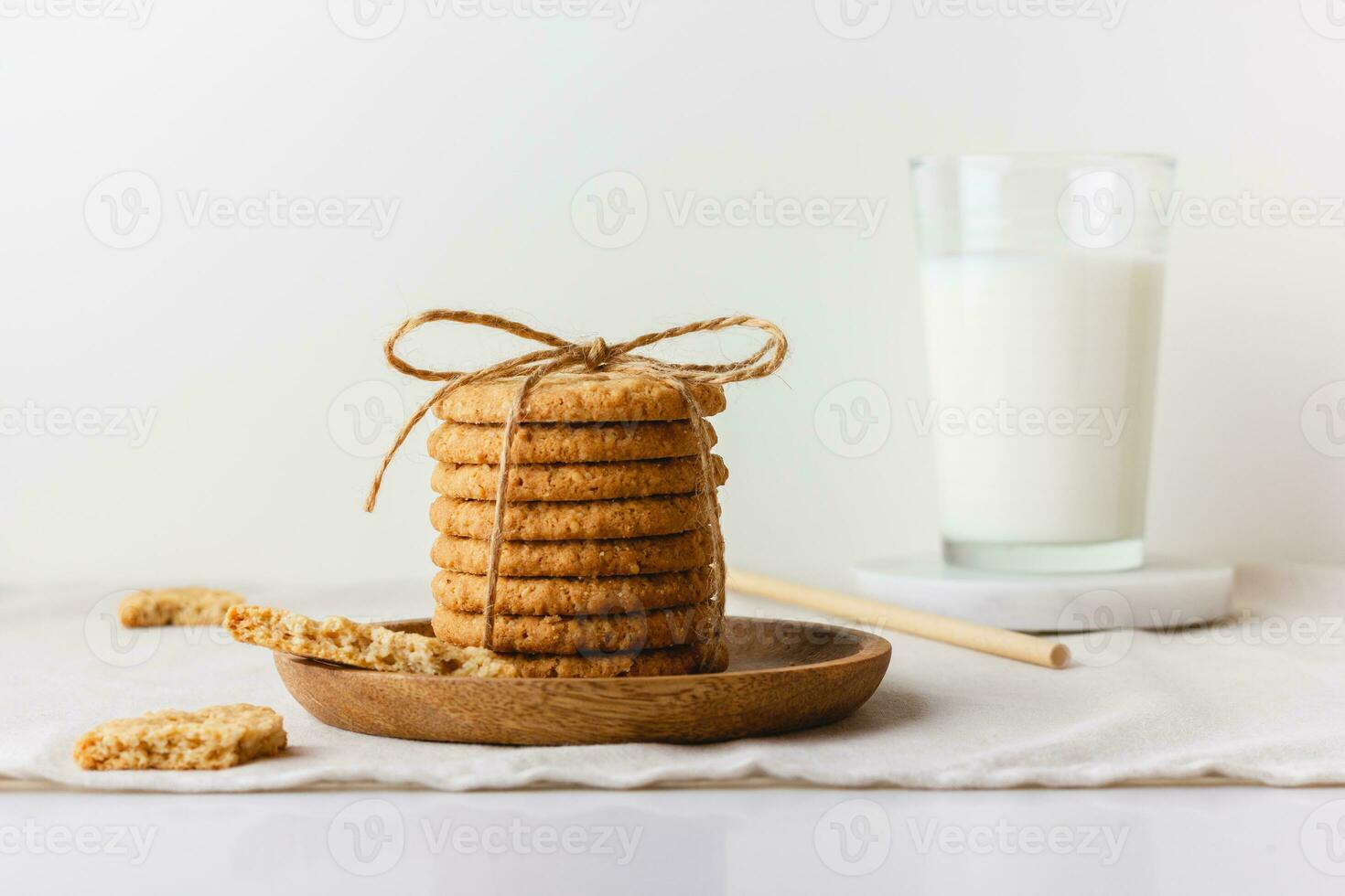 Oat cookies on a wooden plate photo