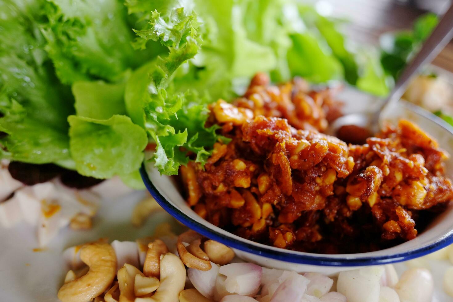 A royal leaf wrap appetizer Miang Kham is a snack dish originated in Thai royal cuisine in the central part of Thailand photo