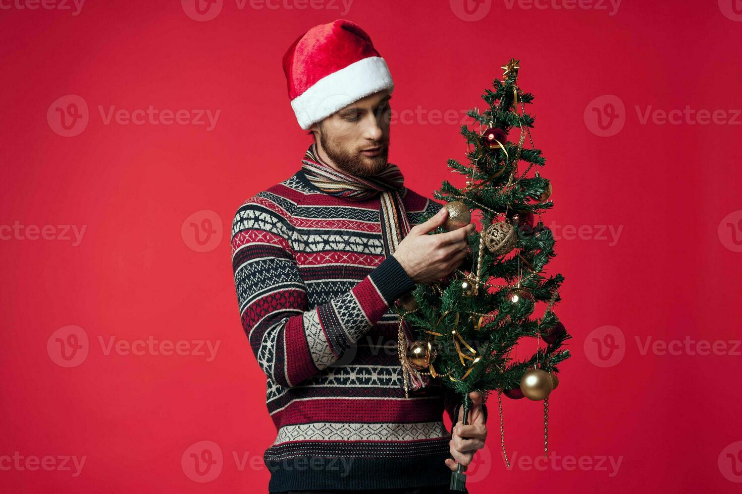 handsome man in New Year's clothes decoration christmas isolated background photo