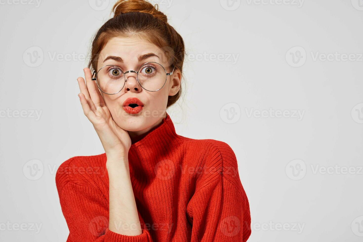 portrait of a woman in a red sweater Lifestyle Studio fun model photo