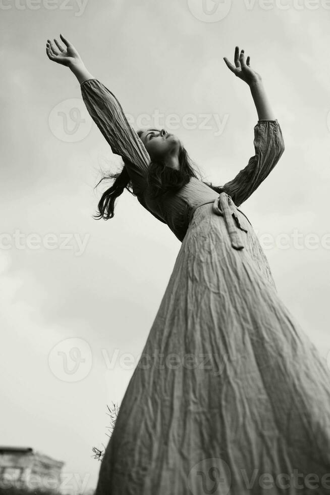 beautiful woman long hairstyle in outdoor wedding dress black and white photo