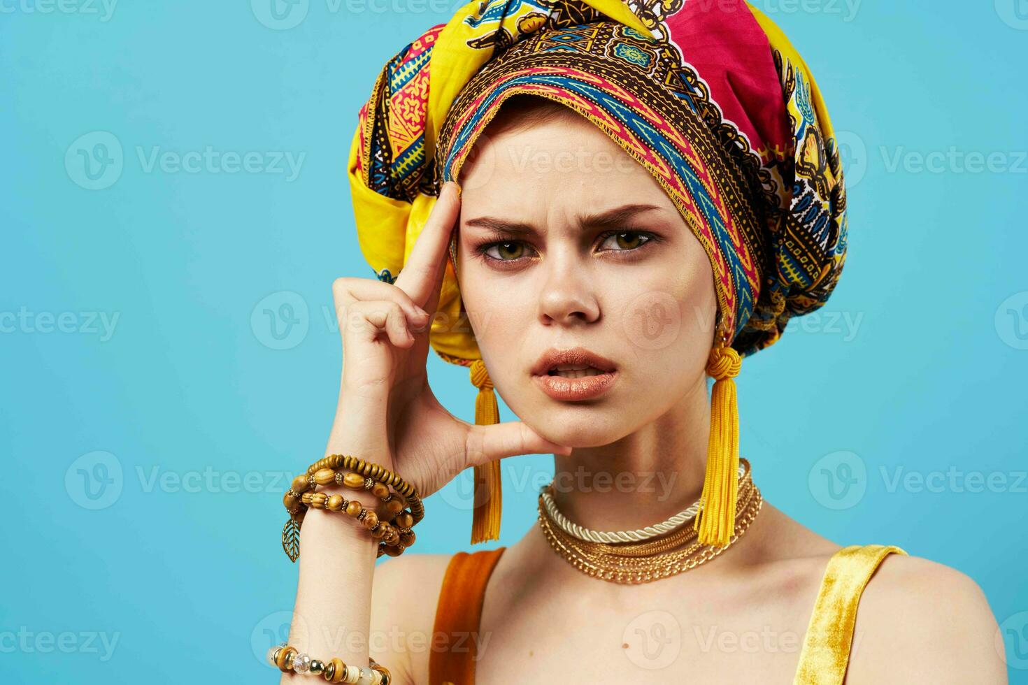 woman in multicolored turban luxury ethnicity blue background 23758088