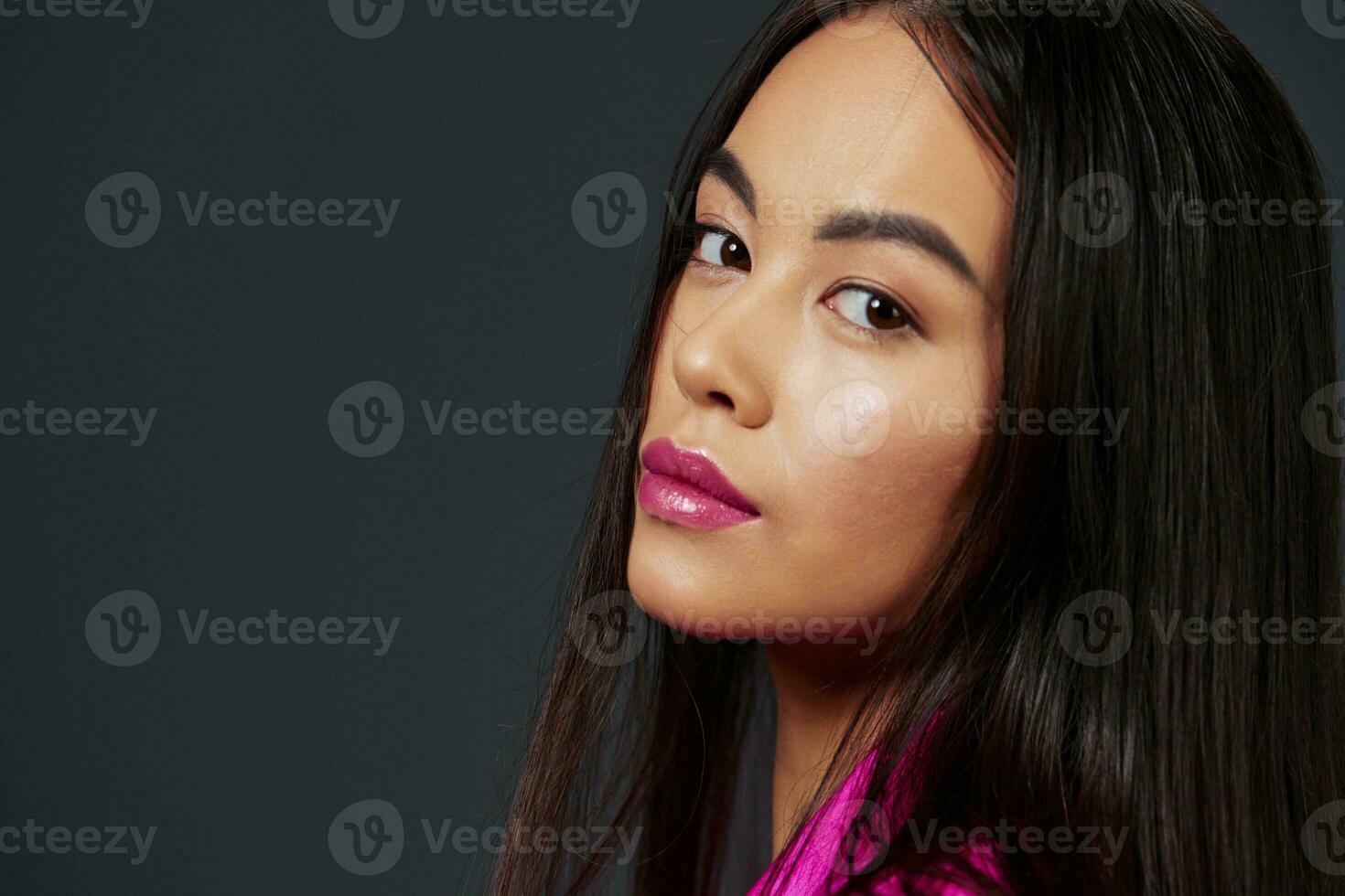 beautiful woman in a pink mini dress luxury isolated background photo