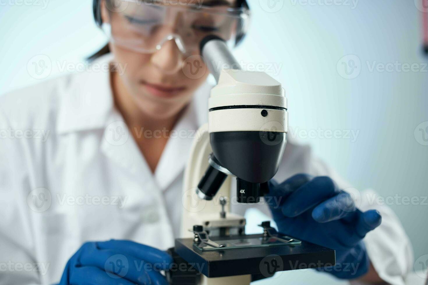 woman scientist laboratory research biotechnology diagnostics photo