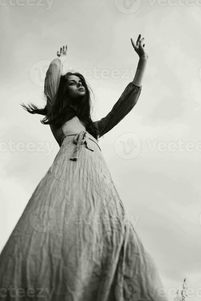 pretty woman long hairstyle in outdoor wedding dress black and white photo