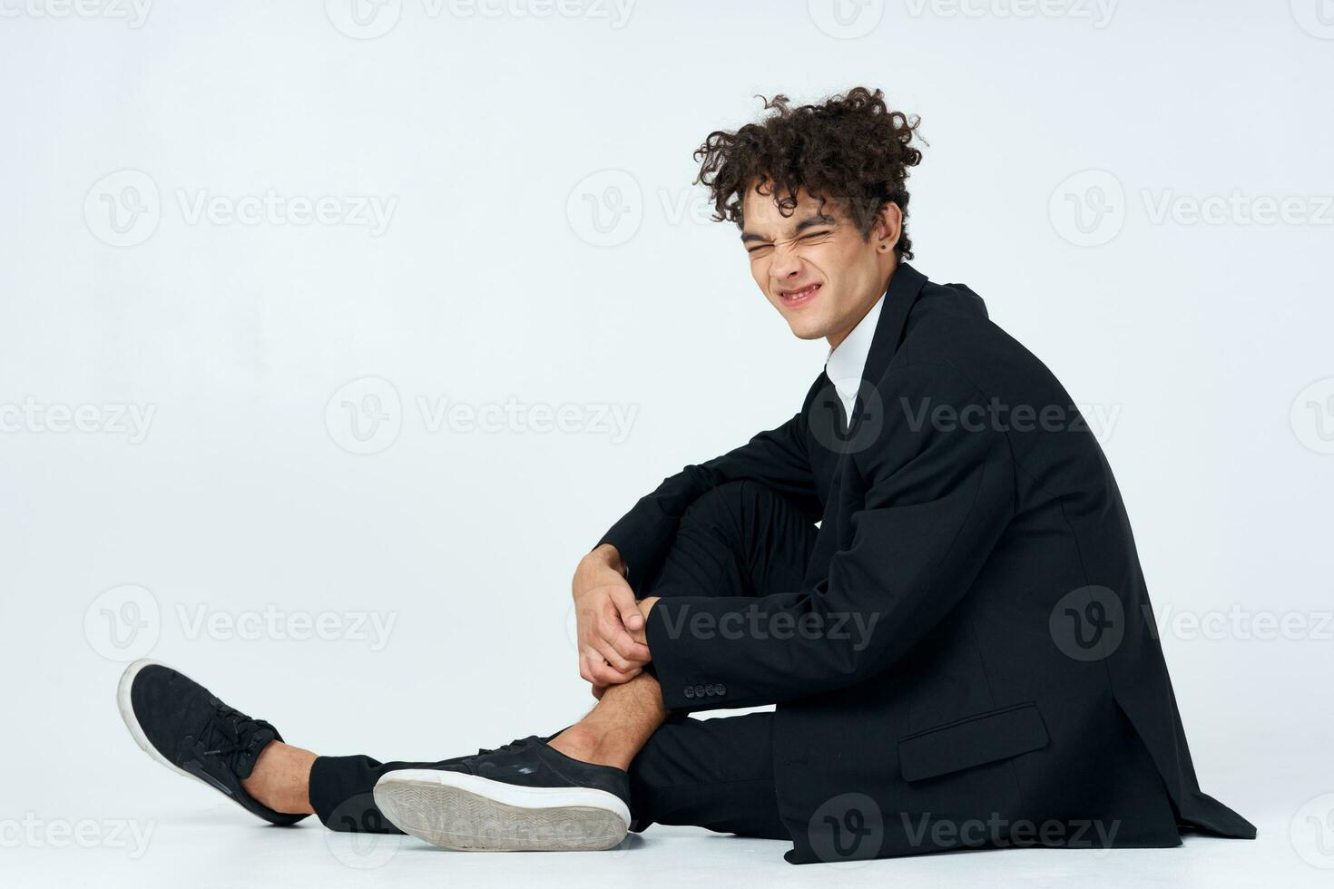 business man curly hair self confidence emotions posing photo