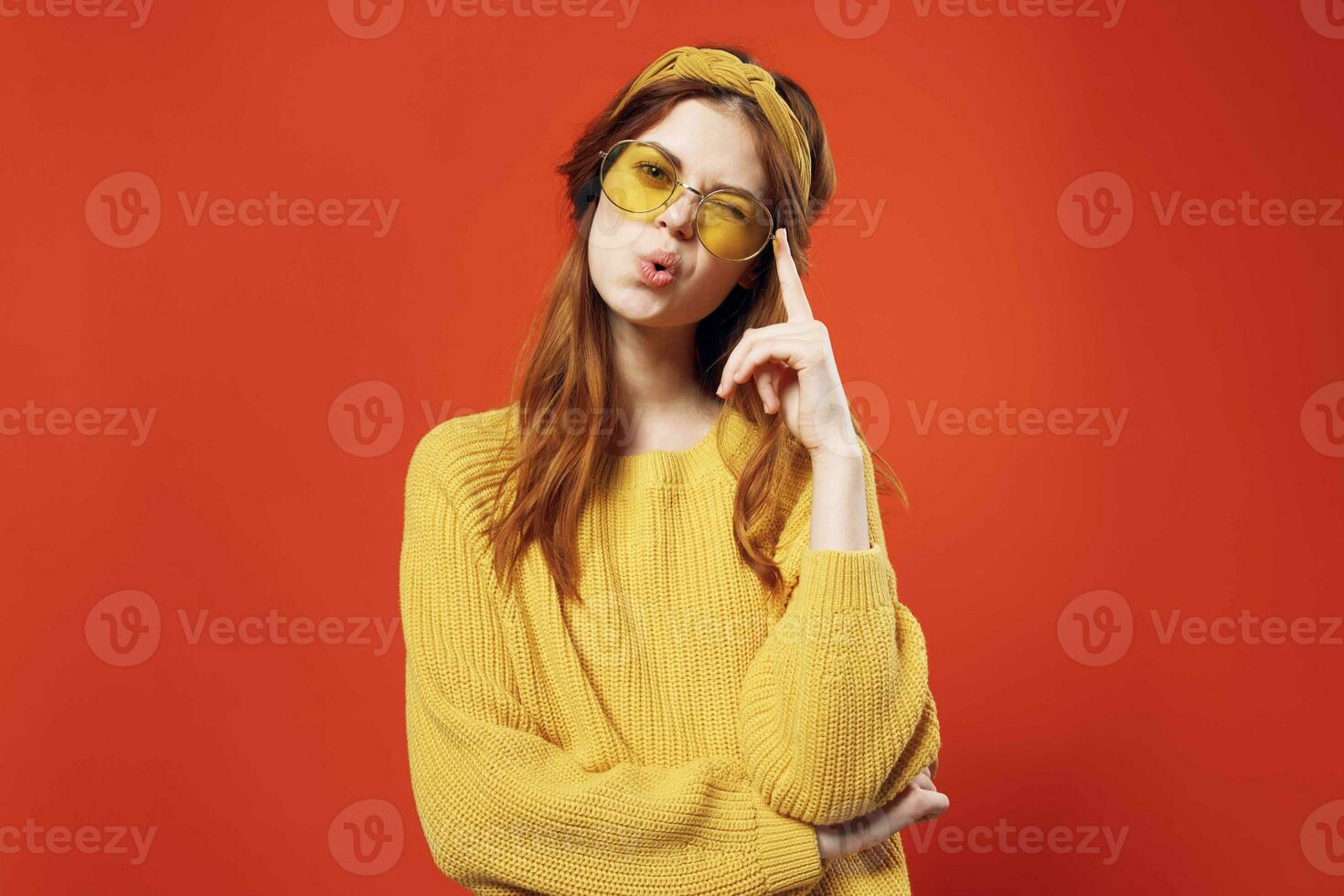 emotional woman in yellow sweater and hippie fashion retro style photo