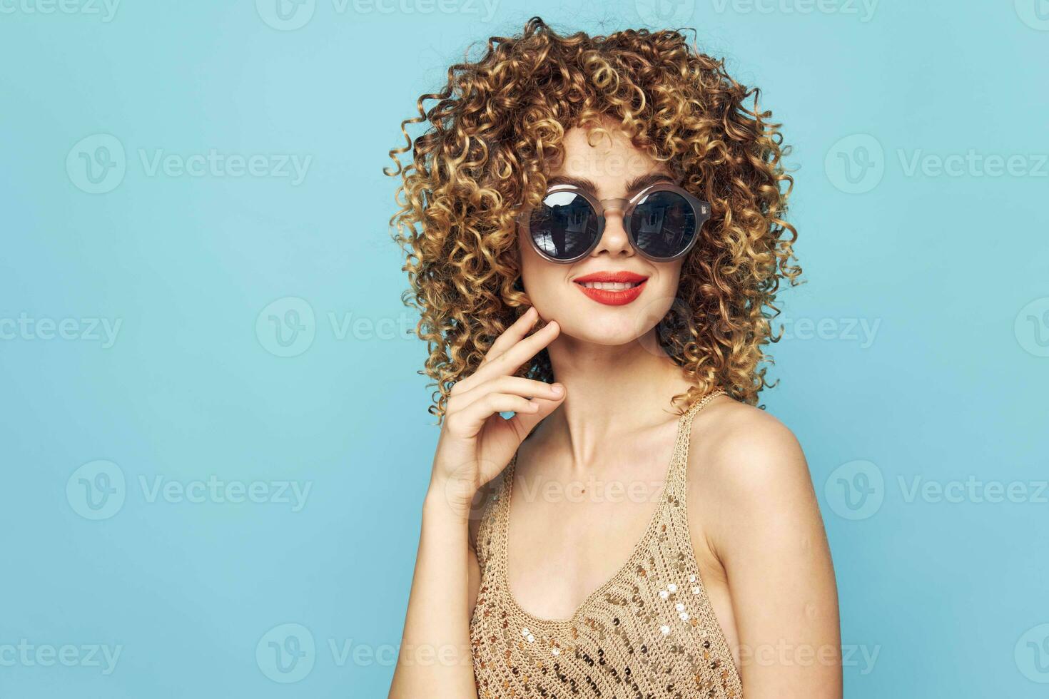 Pretty woman Smile red lips blue pattern background glasses bright makeup photo