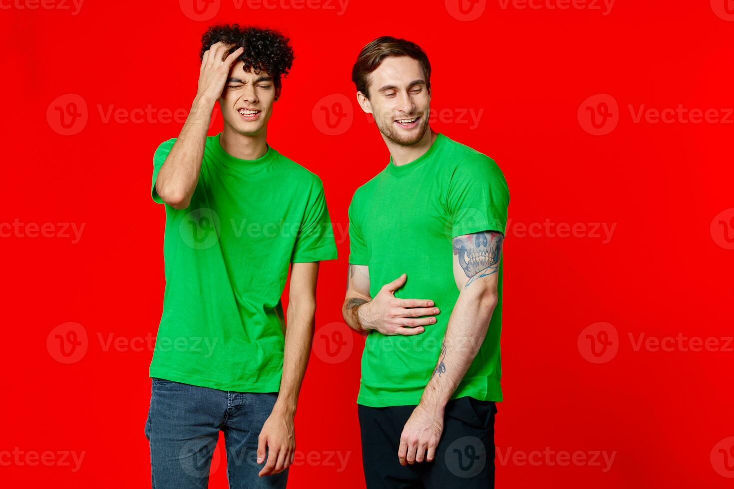 Cheerful friends in green t-shirts communication emotions isolated background photo