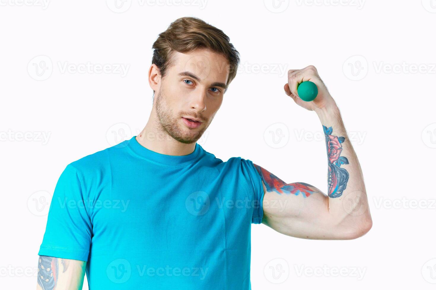 athletic man with inflated arm dumbbell biceps workout photo