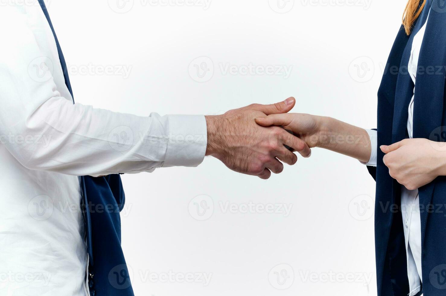 work colleagues shake hands communication contract light background photo