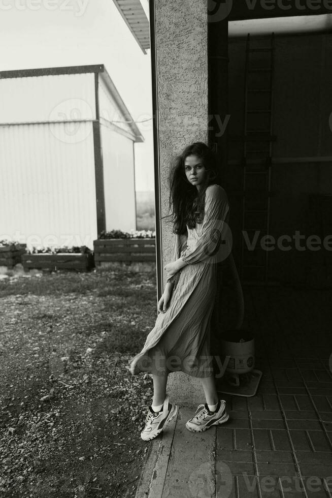 woman long hair posing fashion charm black and white photo