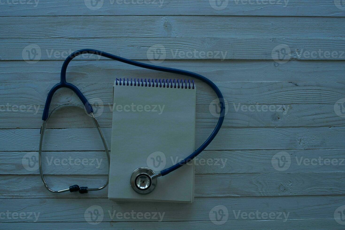 pills stethoscope wooden background treatment hospital photo