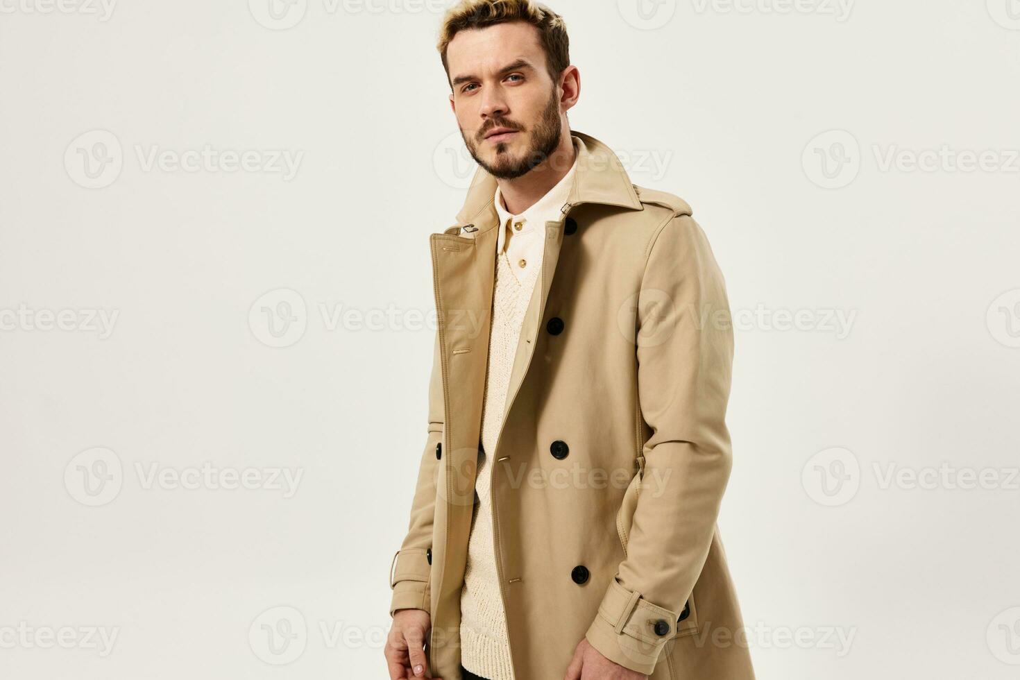 handsome man in coat fashion glamor attractive look modern style photo